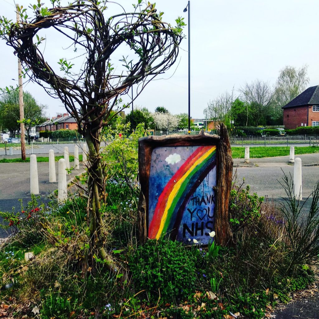 Rainbow on noticeboard Swan Corner