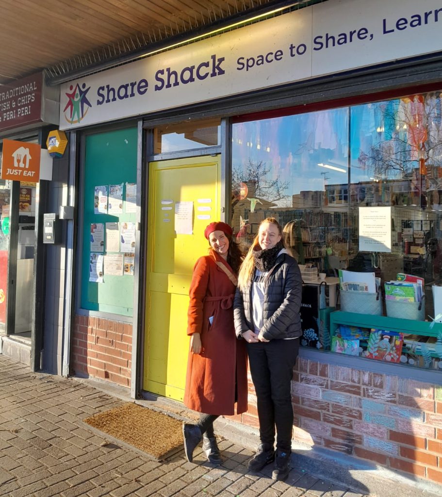 Shaana and Joanne are standing outside the Share Shack